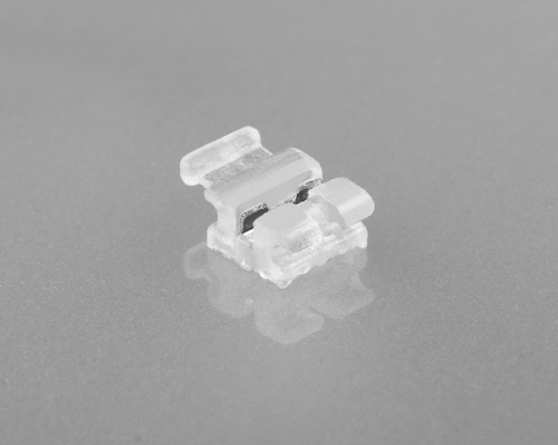 Brackets ortodontici in plastica composita 0,018